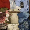 TSC654 2 The photo shows a package with clothing in the category TSC.