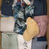 TSC658 2 The photo shows a package with clothing in the category TSC.