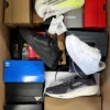 The photo shows a package with footwear in the category CS.