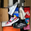 The photo shows a package with footwear in the category CS.