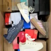 The photo shows a package with footwear in the category CS.