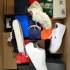 The photo shows a package with footwear in the category CS.