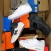 The photo shows a package with footwear in the category CS.