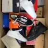 The photo shows a package with footwear in the category CS.