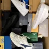 The photo shows a package with footwear in the category CS.