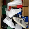 The photo shows a package with footwear in the category CS.