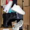 The photo shows a package with footwear in the category CS.