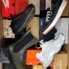 The photo shows a package with footwear in the category CS.
