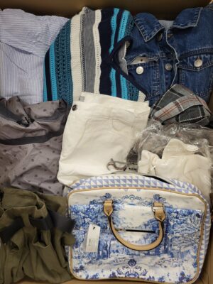 The photo shows a package with clothing in the category TSC.