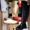 The photo shows a package with footwear in the category CS.