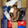 The photo shows a package with footwear in the category CS.