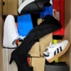 The photo shows a package with footwear in the category CS.
