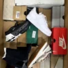 The photo shows a package with footwear in the category CS.