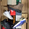 The photo shows a package with footwear in the category CS.