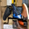 The photo shows a package with footwear in the category CS.
