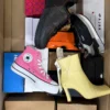 The photo shows a package with footwear in the category CS.