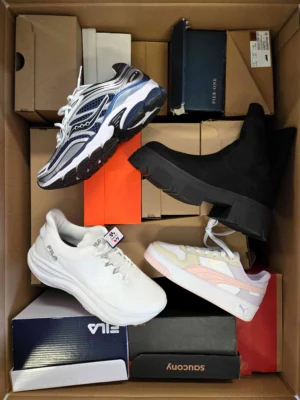 The photo shows a package with footwear in the category CS.
