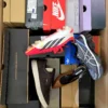 The photo shows a package with footwear in the category CS.