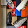 The photo shows a package with footwear in the category CS.