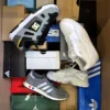 The photo shows a package with footwear in the category CS.