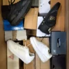 The photo shows a package with footwear in the category CS.