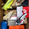 The photo shows a package with footwear in the category CS.