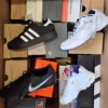 The photo shows a package with footwear in the category CS.