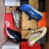 The photo shows a package with footwear in the category CS.