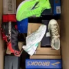 The photo shows a package with footwear in the category CS.