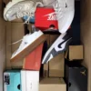 The photo shows a package with footwear in the category CS.