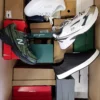 The photo shows a package with footwear in the category CS.