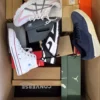 The photo shows a package with footwear in the category CS.