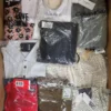 The photo shows a package with clothing in the category AP.