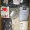 The photo shows a package with clothing in the category AP.