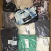 The photo shows a package with clothing in the category AP.