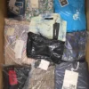 The photo shows a package with clothing in the category AP.