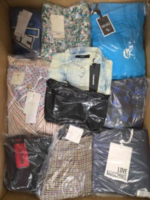 The photo shows a package with clothing in the category AP.