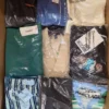 The photo shows a package with clothing in the category AP.