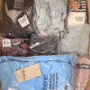 BY101 1 The photo shows a package with clothing in the category B.