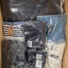 The photo shows a package with clothing in the category B.