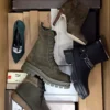 The photo shows a package with footwear in the category AS.