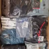 BY105 1 The photo shows a package with clothing in the category B.