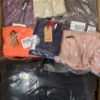 BY107 1 The photo shows a package with clothing in the category B.