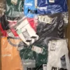 The photo shows a package with clothing in the category H.