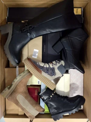 The photo shows a package with footwear in the category AS.