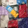 The photo shows a package with clothing in the category H.