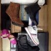 The photo shows a package with footwear in the category AS.