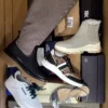 The photo shows a package with footwear in the category AS.