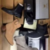 The photo shows a package with footwear in the category AS.