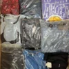 The photo shows a package with clothing in the category D.